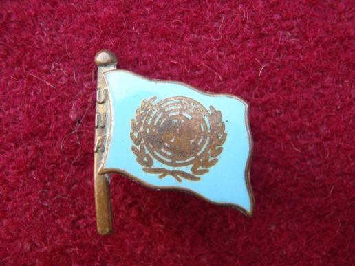 UNA enamel lapel badge