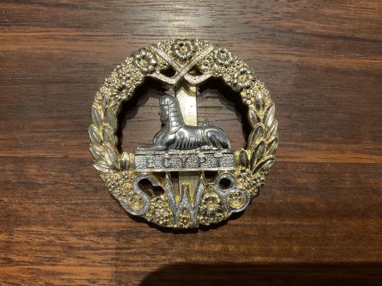 Anodised South Wales borders cap badge