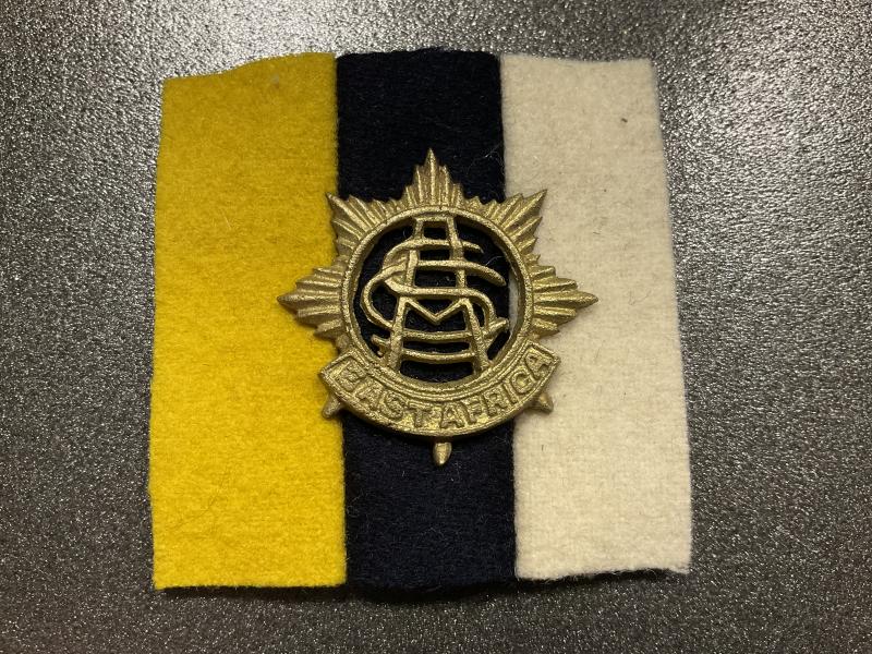 East Africa Army Service corps cap badge and backing