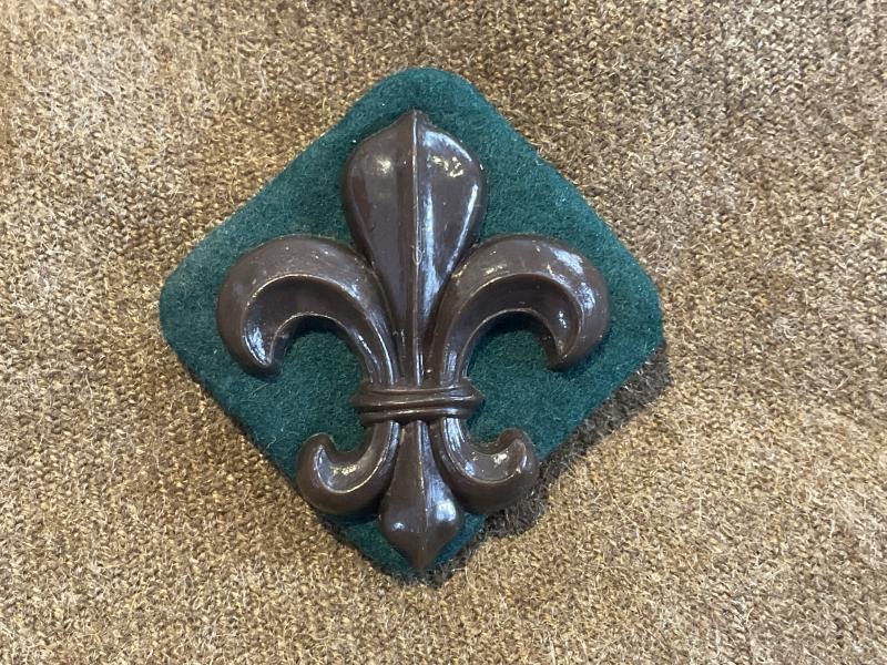 WW2 Economy plastic Manchester Regiment cap badge