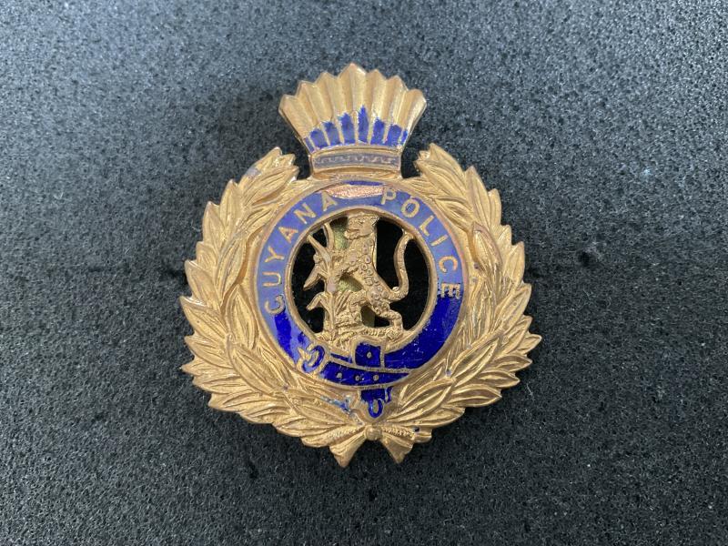 British Guyana Police brass & enamel cap badge.