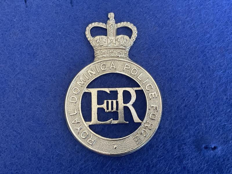 Q/C Royal Dominica Police Force helmet plate.