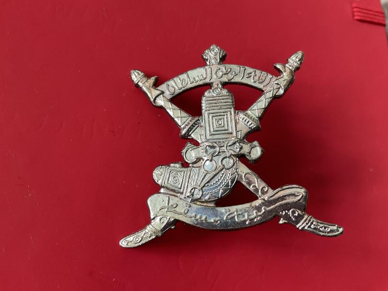 Muscat Regimental cap/ head dress badge.