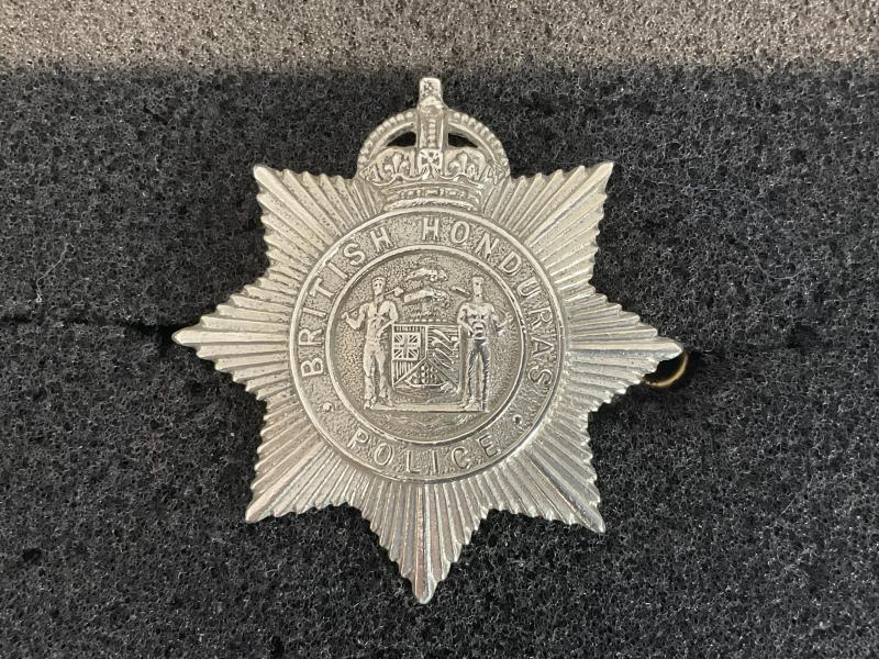K/C British Honduras Police cap badge.