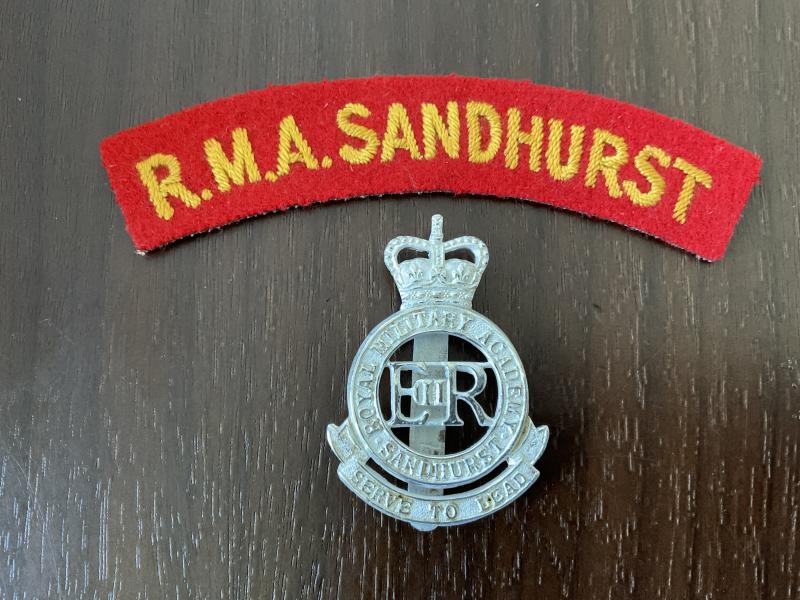 Royal Military Academy Sandhurst cap badge and shoulder titles.