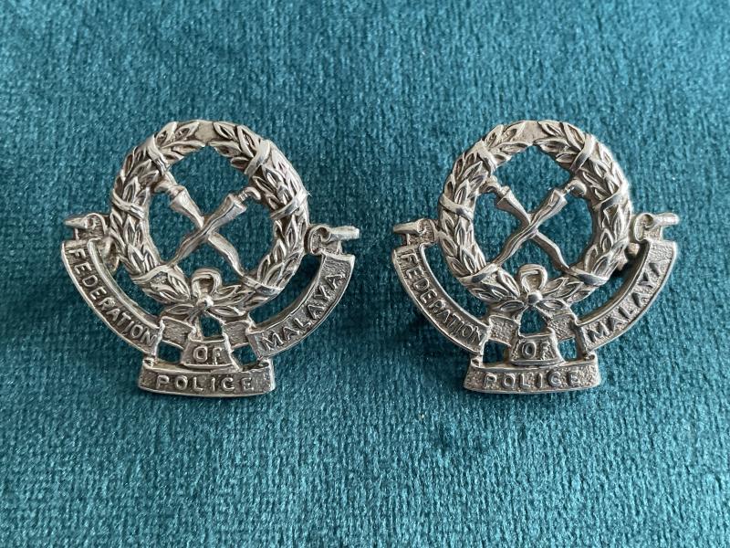 1940-50s Federation of Malaya Police collar badges.
