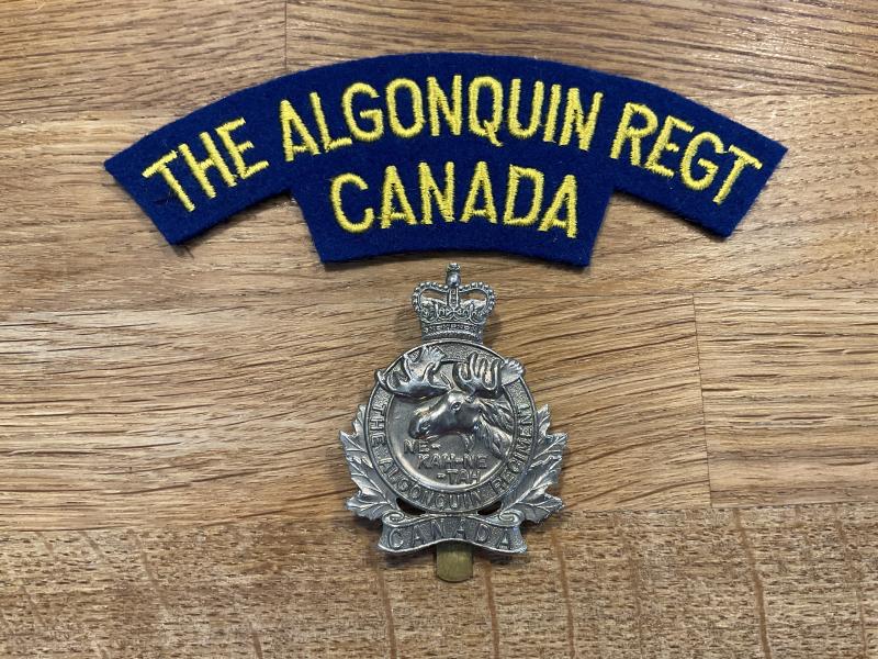 The Algonquin Regt of Canada cap badge & shoulder title.