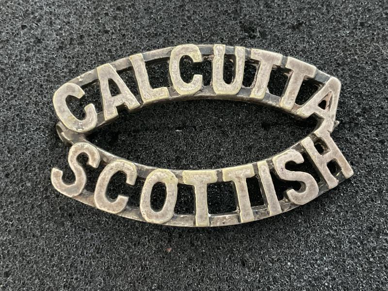 Calcutta Scottish white metal shoulder title.