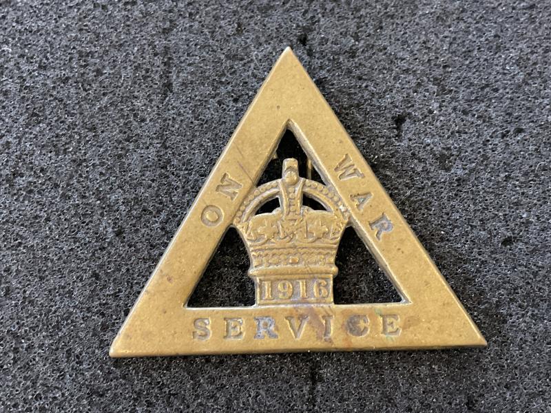 WW1 On War Service 1916 brass triangle badge