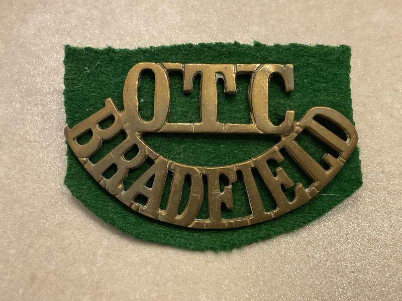 BRADFIELD COLLEGE O.T.C brass shoulder title.