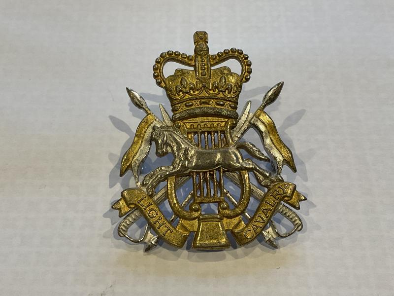 British Army Light Cavalry Band cap badge.