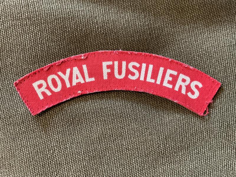WW2 Printed ROYAL FUSILIERS shoulder title, removed from uniform.